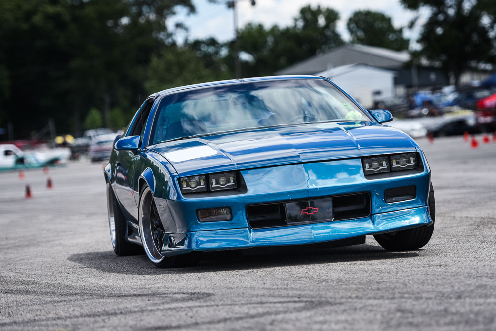 A third camaro f body cornering on an autocross course. A third camaro f body cornering on an autocross course.